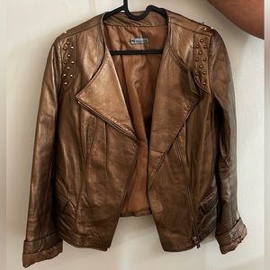 Gold/bronze leather jacket with spike studs